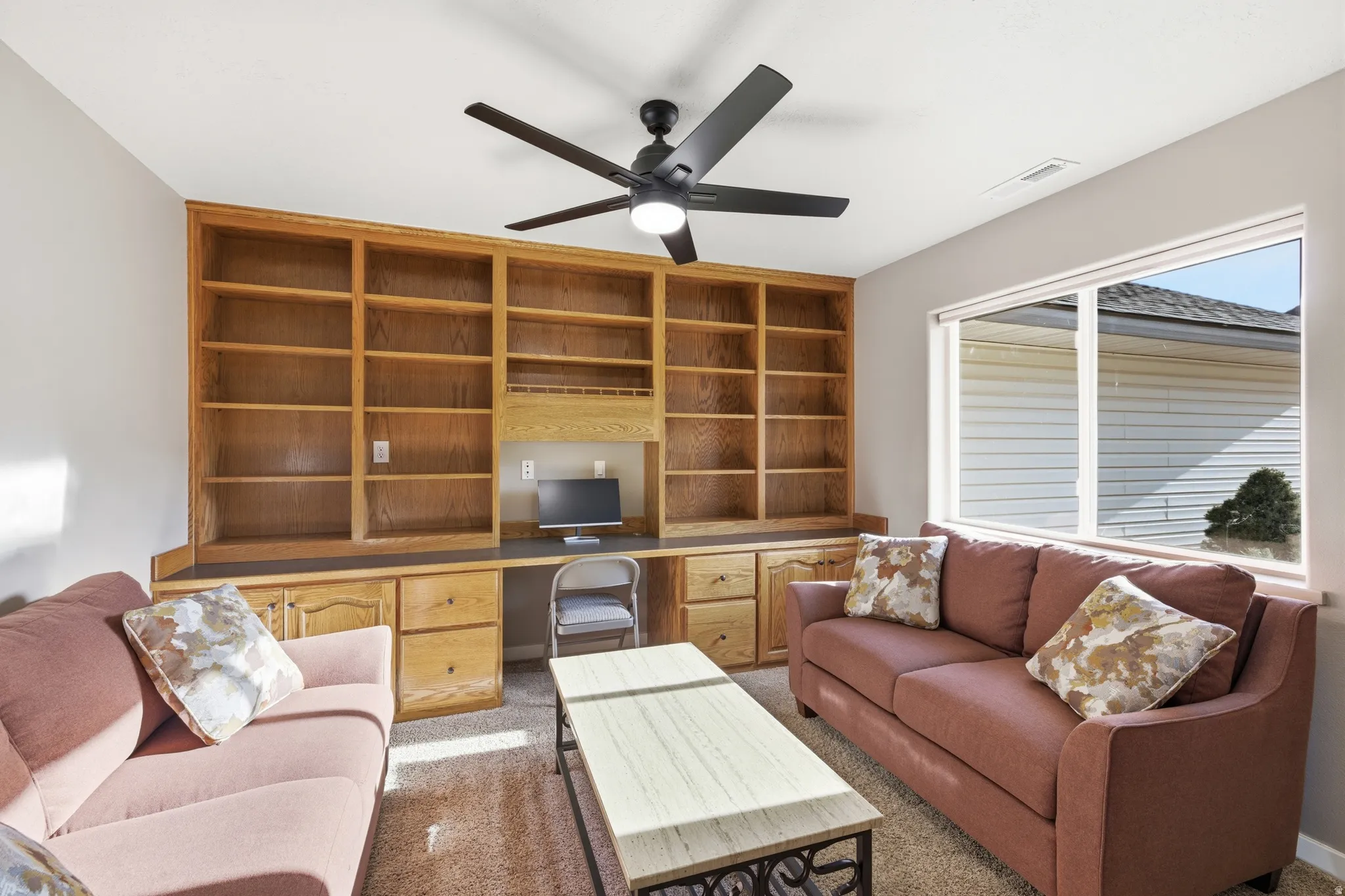 Office with built in shelving
