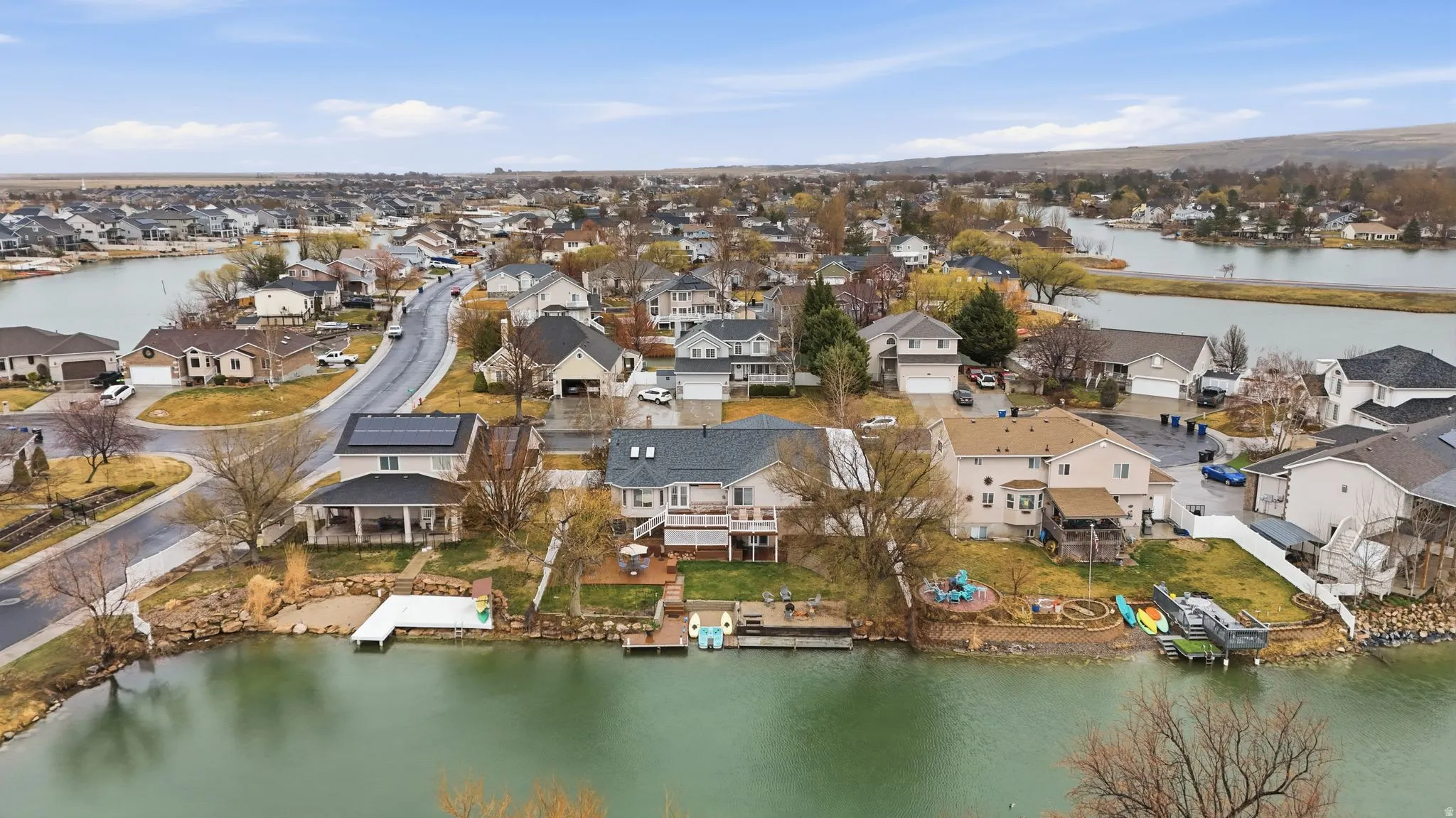 Aerial view of residential area with a large body of water