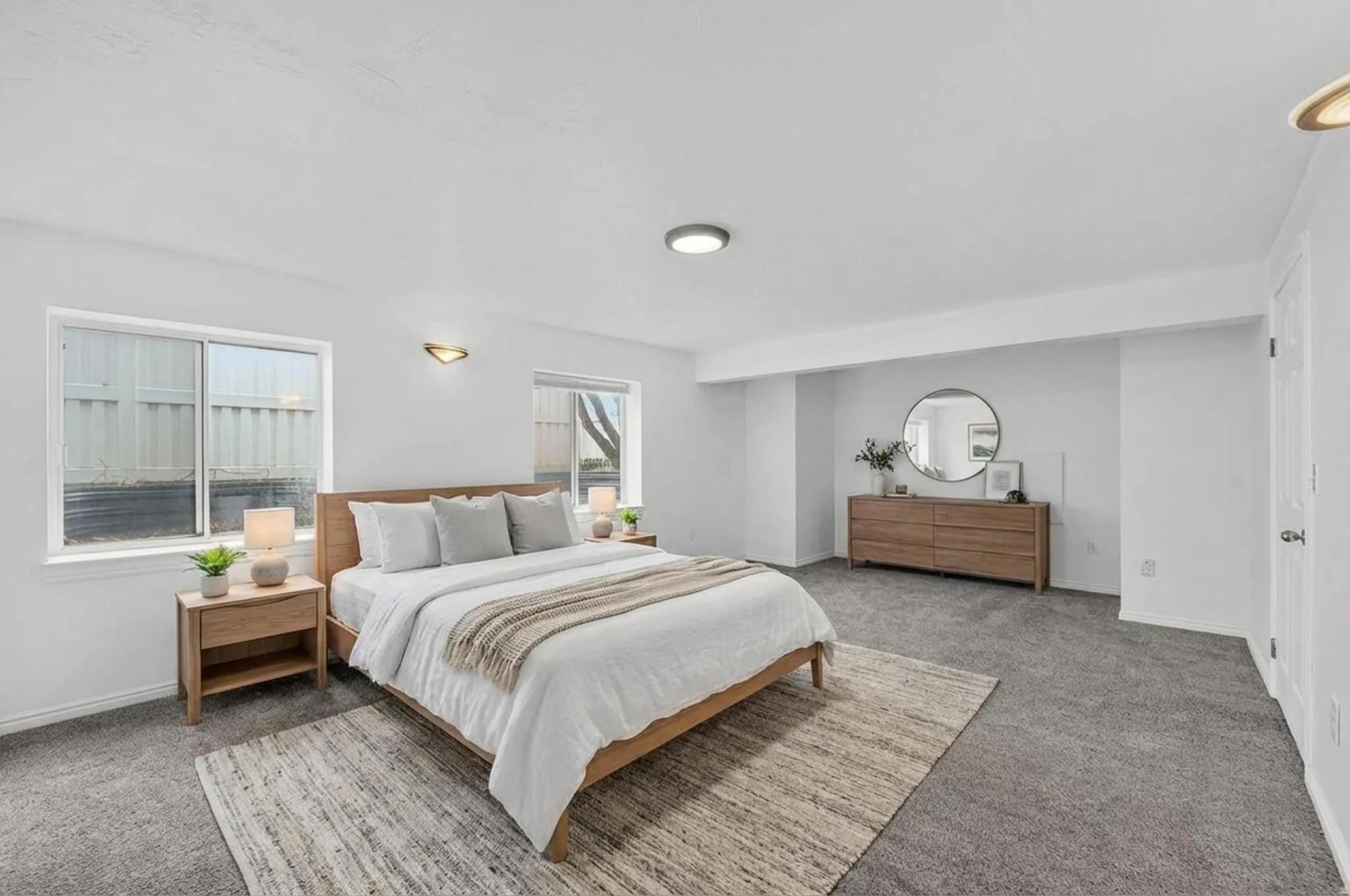 Carpeted bedroom with baseboards