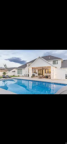 Swimming pool featuring a patio area