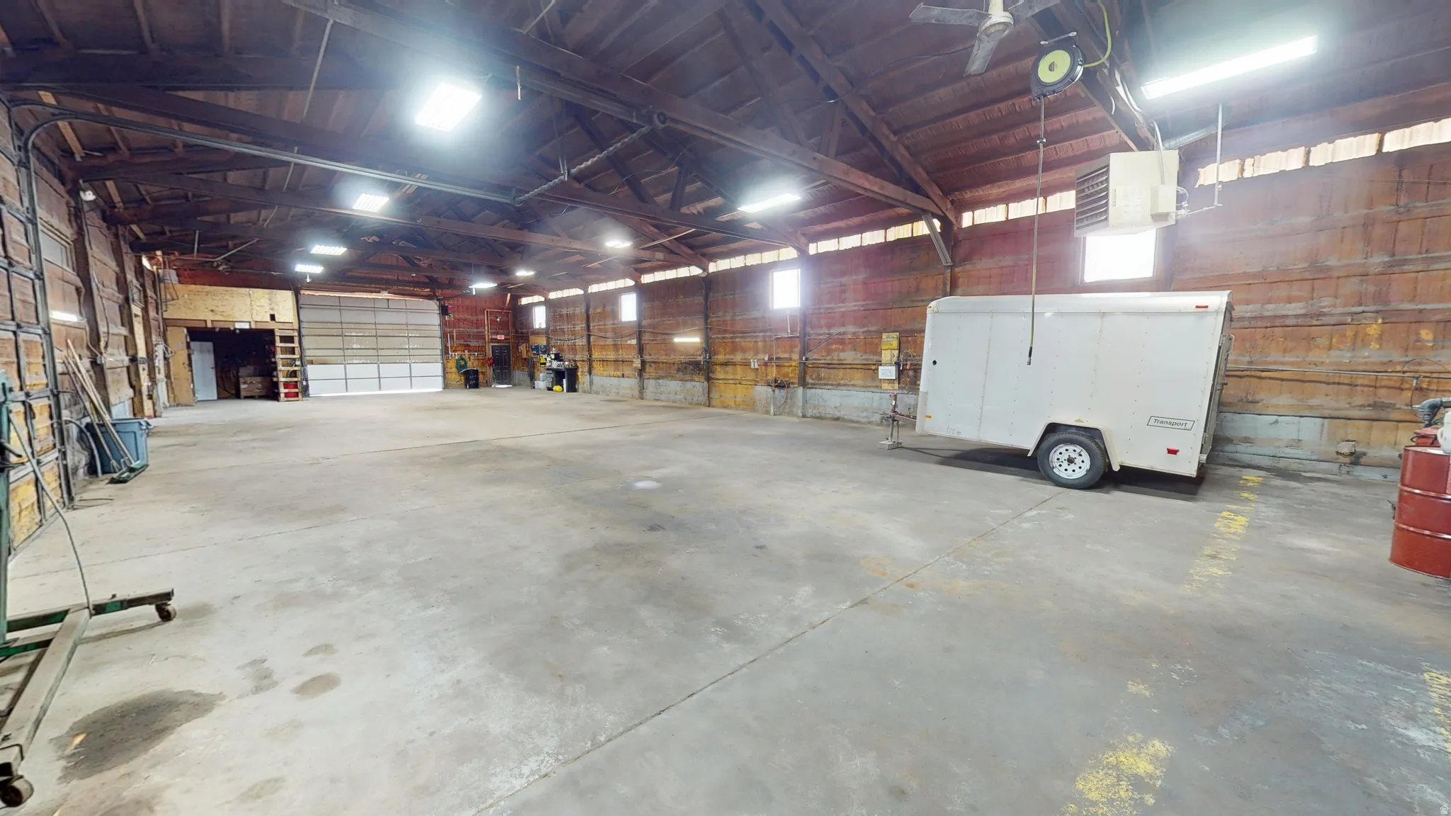 Garage featuring a heating unit