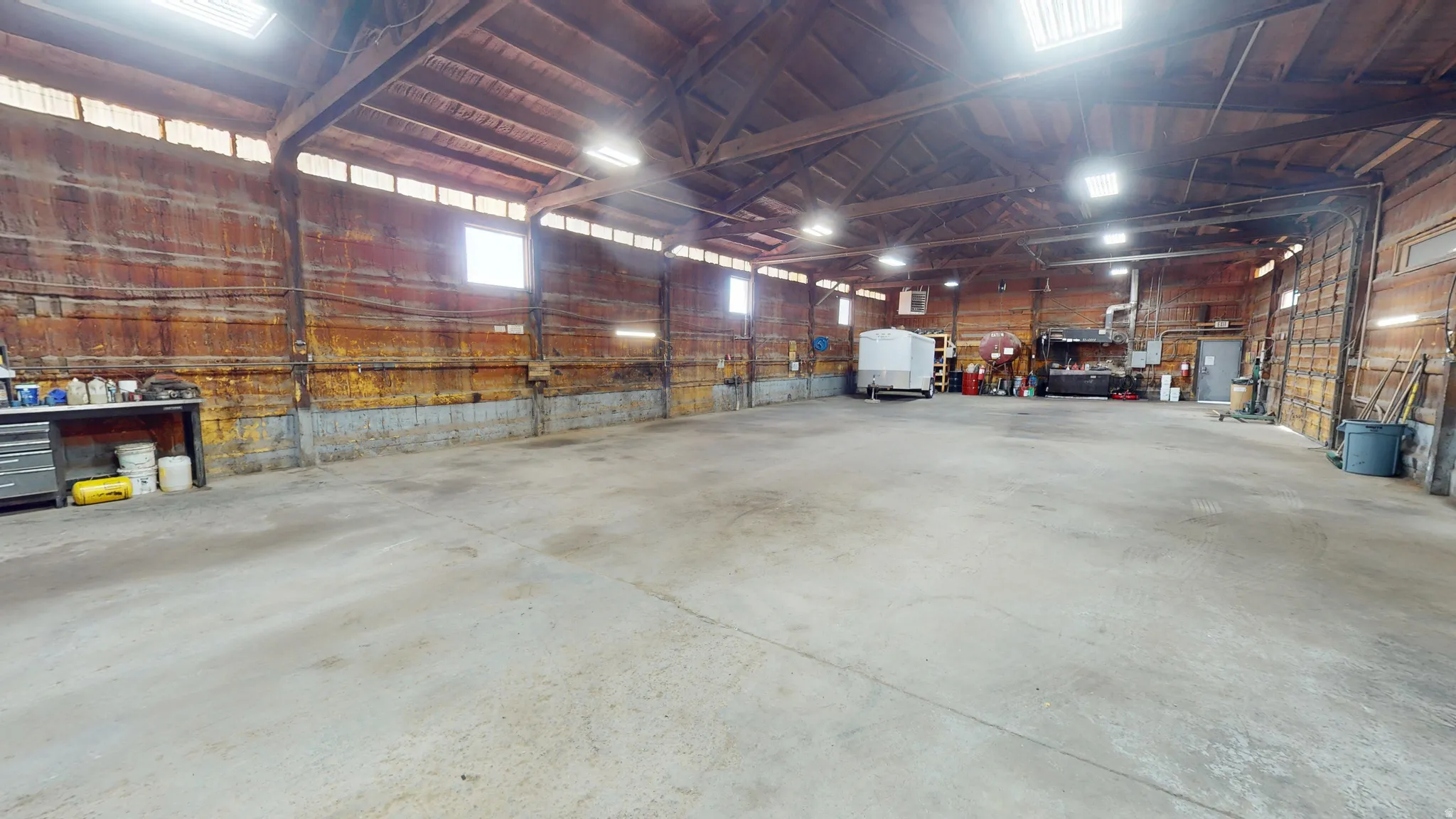 Garage featuring a heating unit