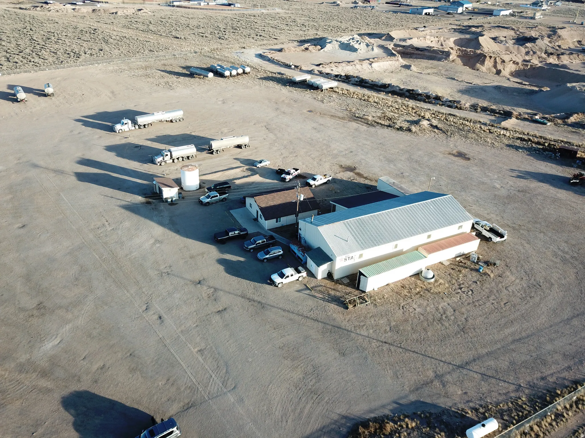 Aerial overview of property's location featuring a desert landscape