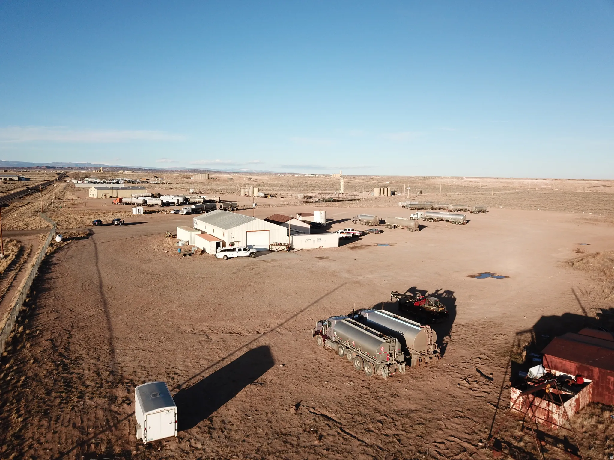 Bird's eye view of a desert landscape and an industrial area