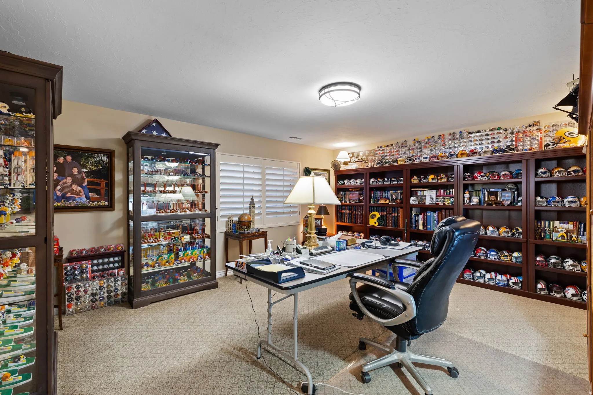 Home office featuring light carpet