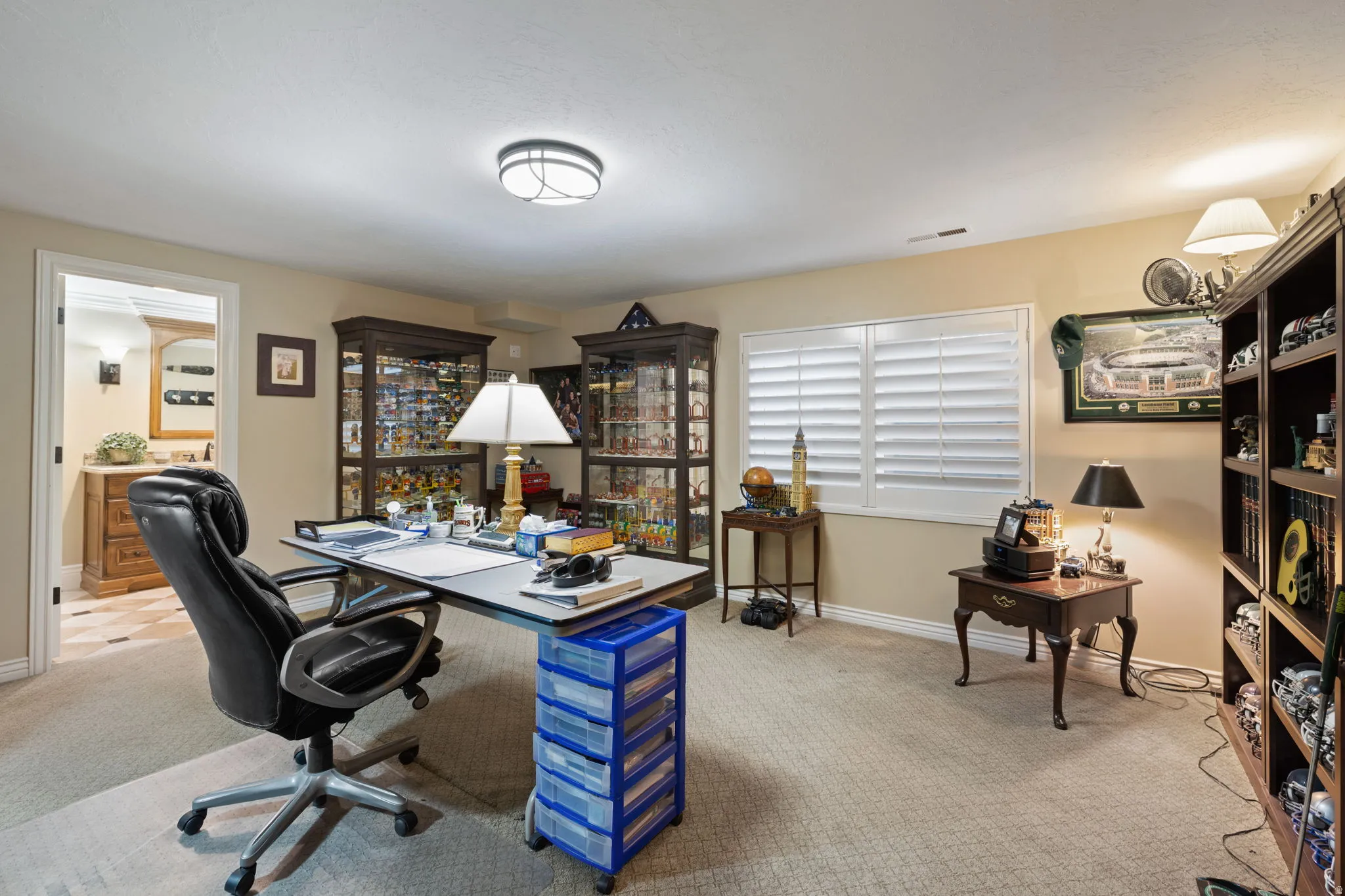 Office featuring light colored carpet