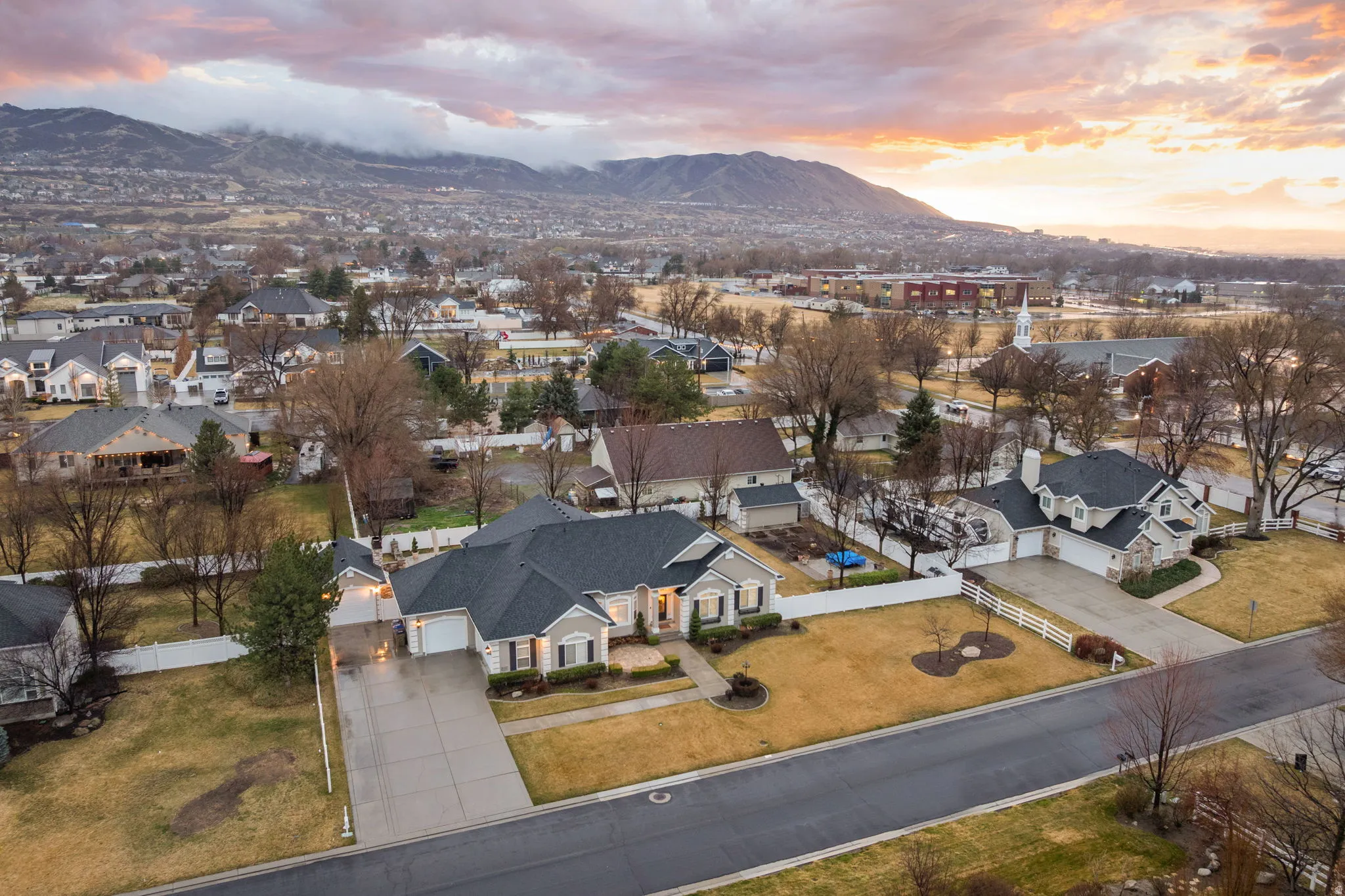 Aerial view of residential area featuring mountains