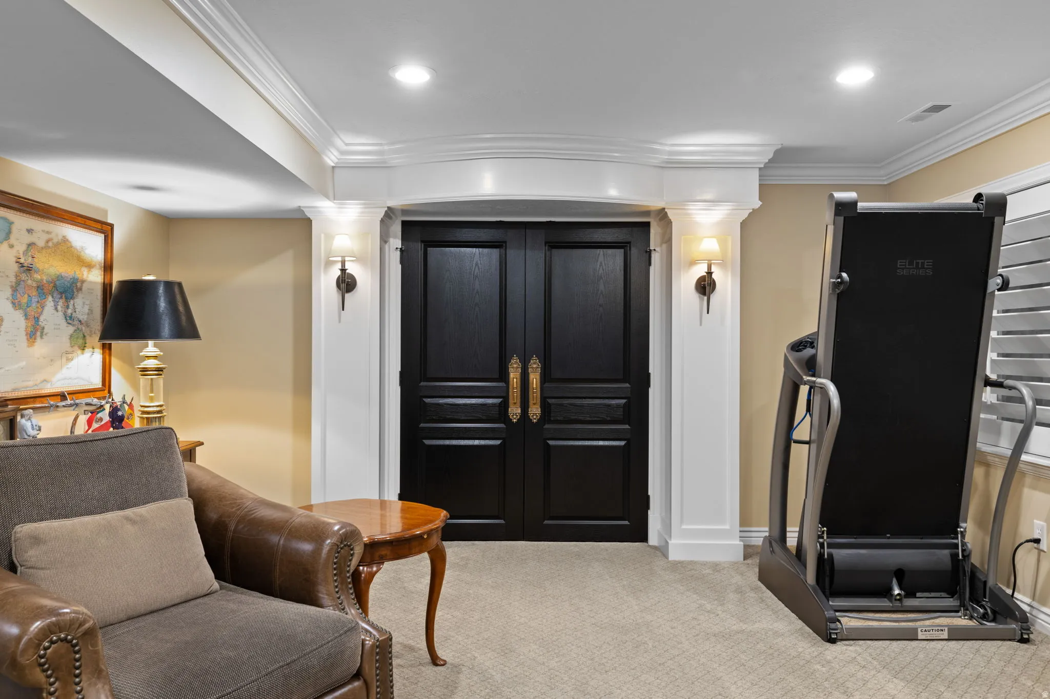 Sitting room featuring ornamental molding, light colored carpet, and recessed lighting