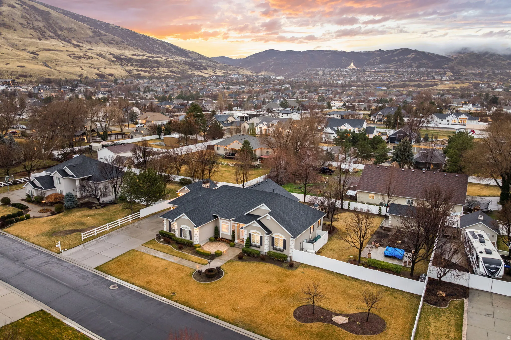Aerial view at dusk of a mountain view and a residential view