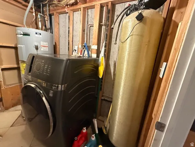 Utility room with washer / dryer and water heater