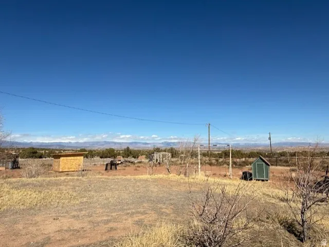 View of yard with a view of countryside