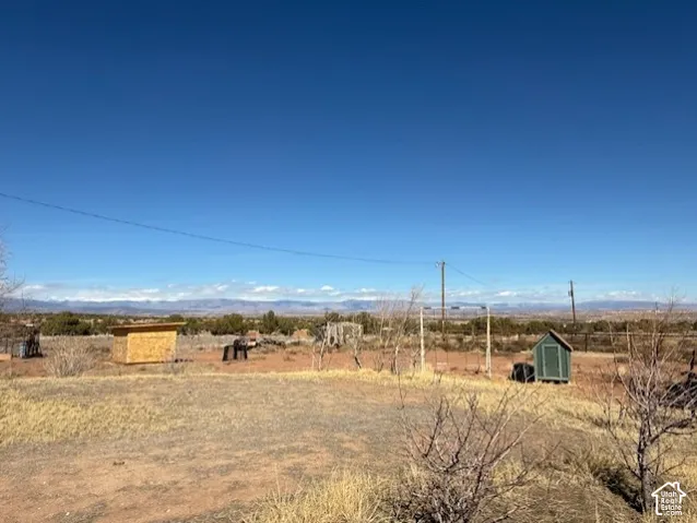 View of yard with a view of countryside