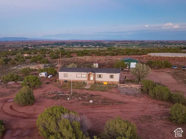 Expansive property with a single-story residence and a detached structure