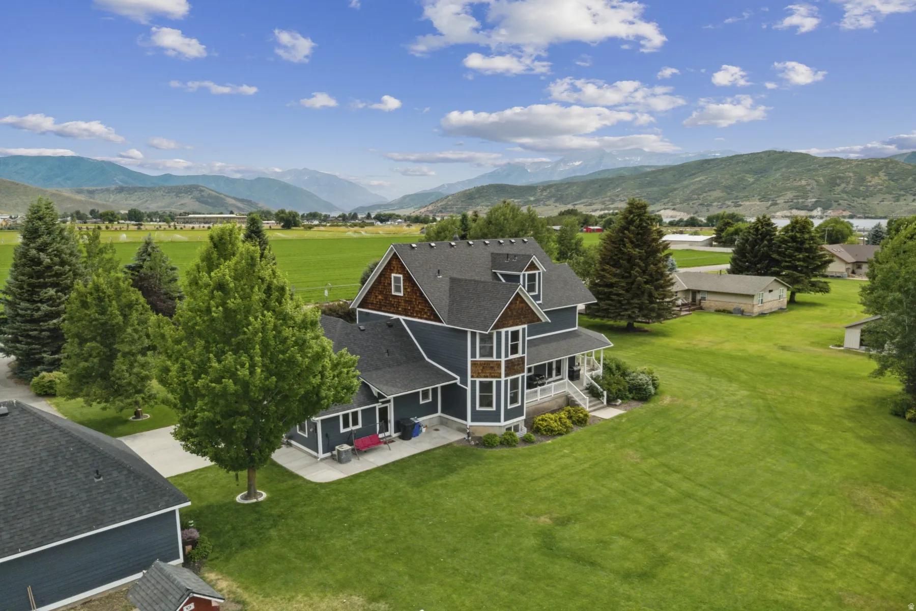 View of subject property with a mountain backdrop