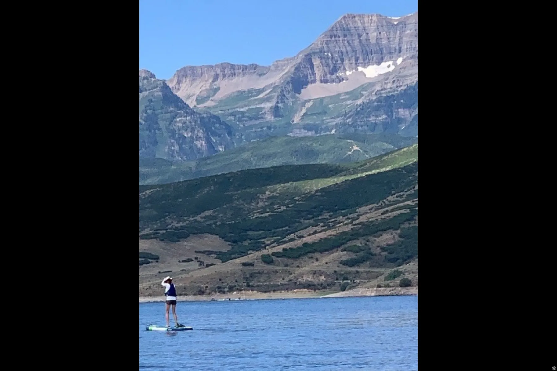 View of mountain background with a large body of water