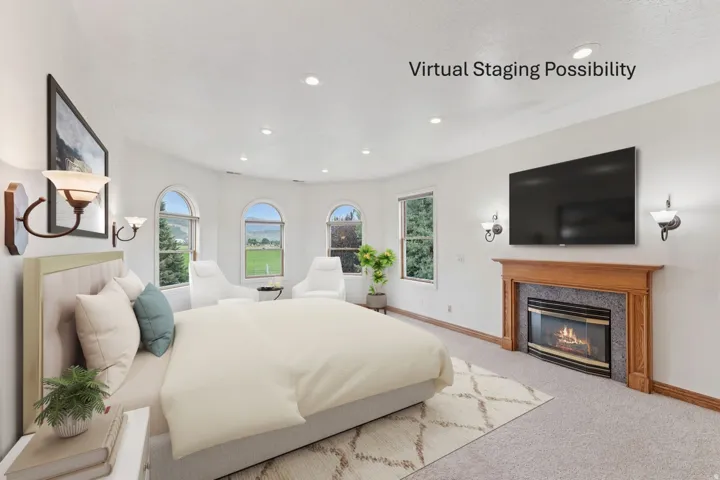 Bedroom with a high end fireplace, carpet flooring, and recessed lighting