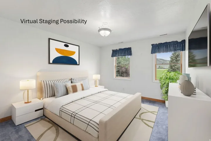 Bedroom featuring carpet floors and a textured ceiling