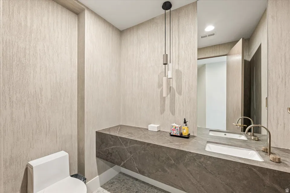 Bathroom with vanity and toilet