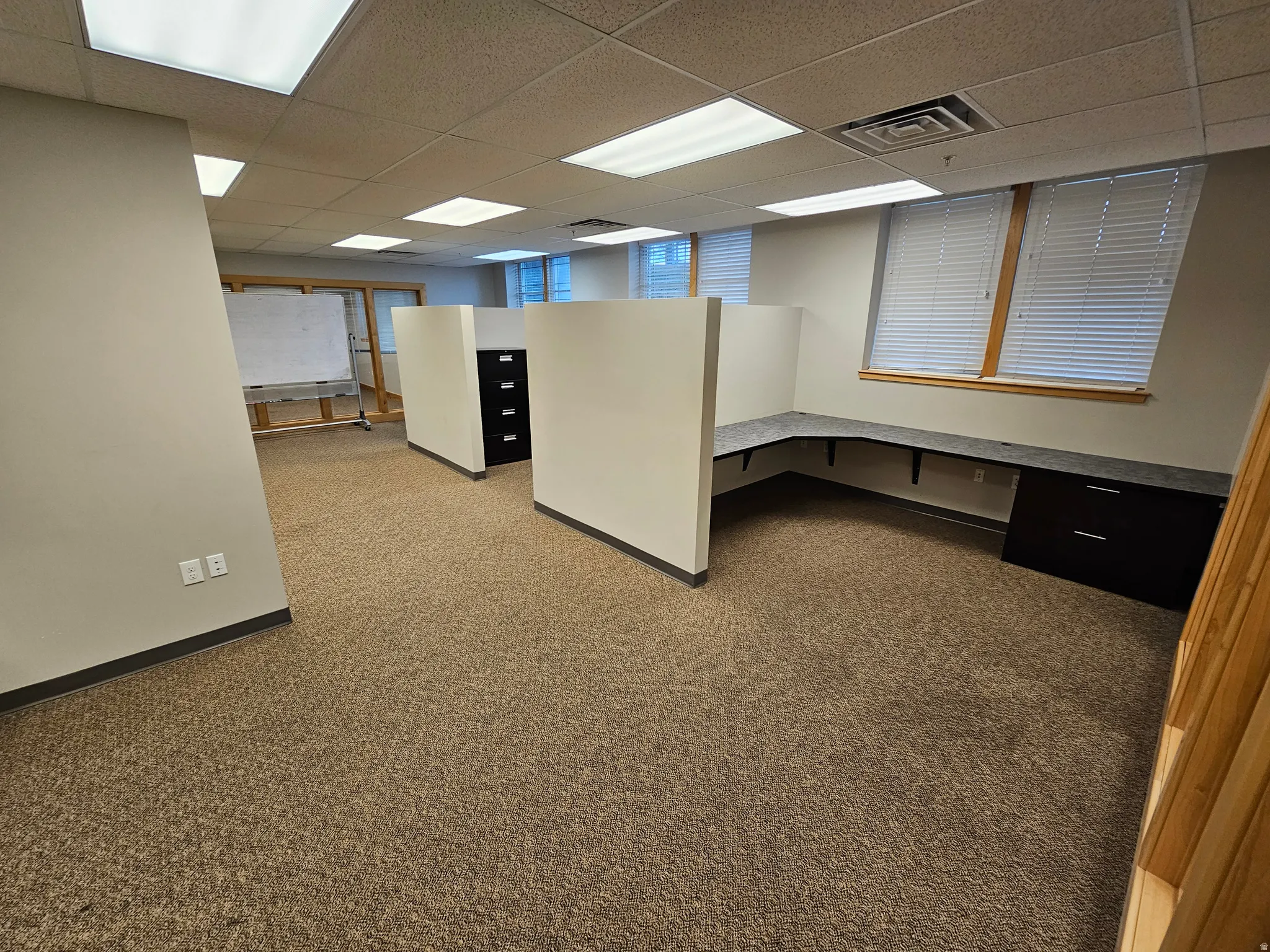 Unfurnished office with a drop ceiling