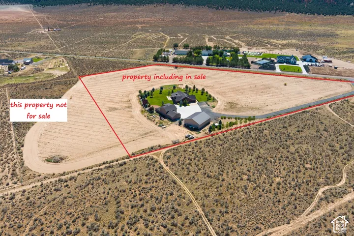 View of rural area with property parcel outlined and a desert landscape