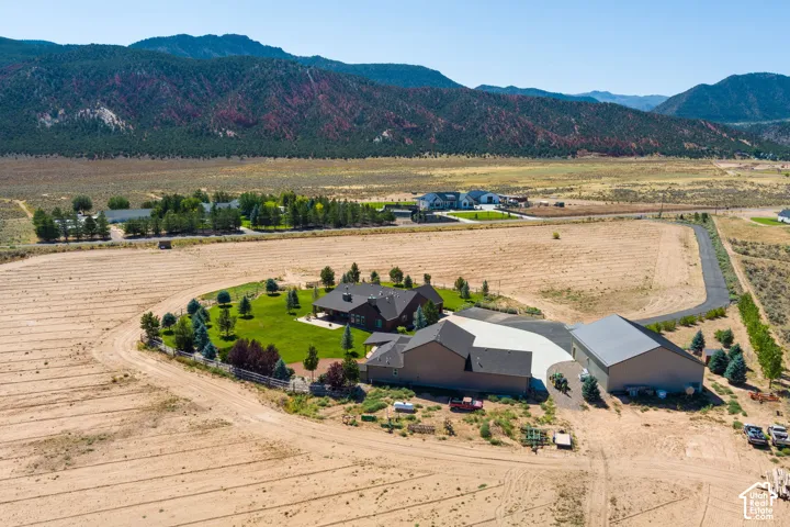 Overview of rural landscape with a mountain backdrop