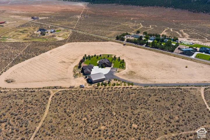 Aerial view of property and surrounding area with rural landscape