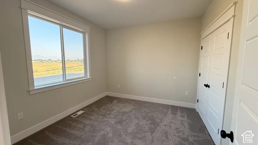 New carpeting and neutral wall tones