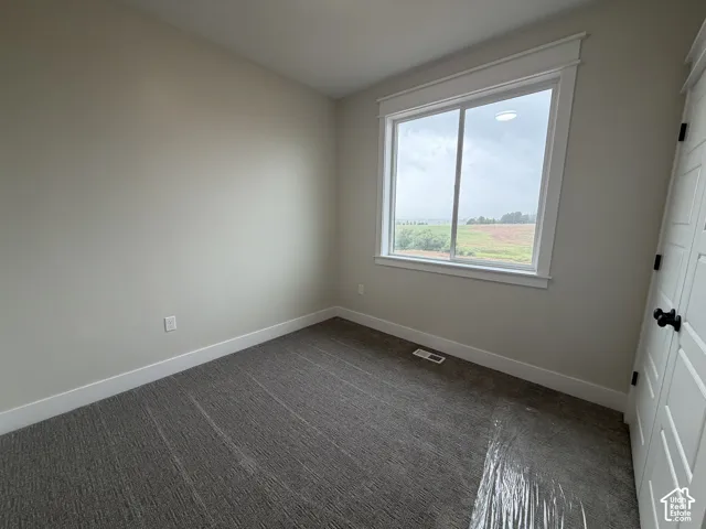 Neutral tone walls with white trim throughout