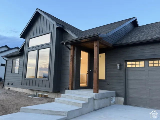 Modern exterior with vertical and horizontal dark gray siding