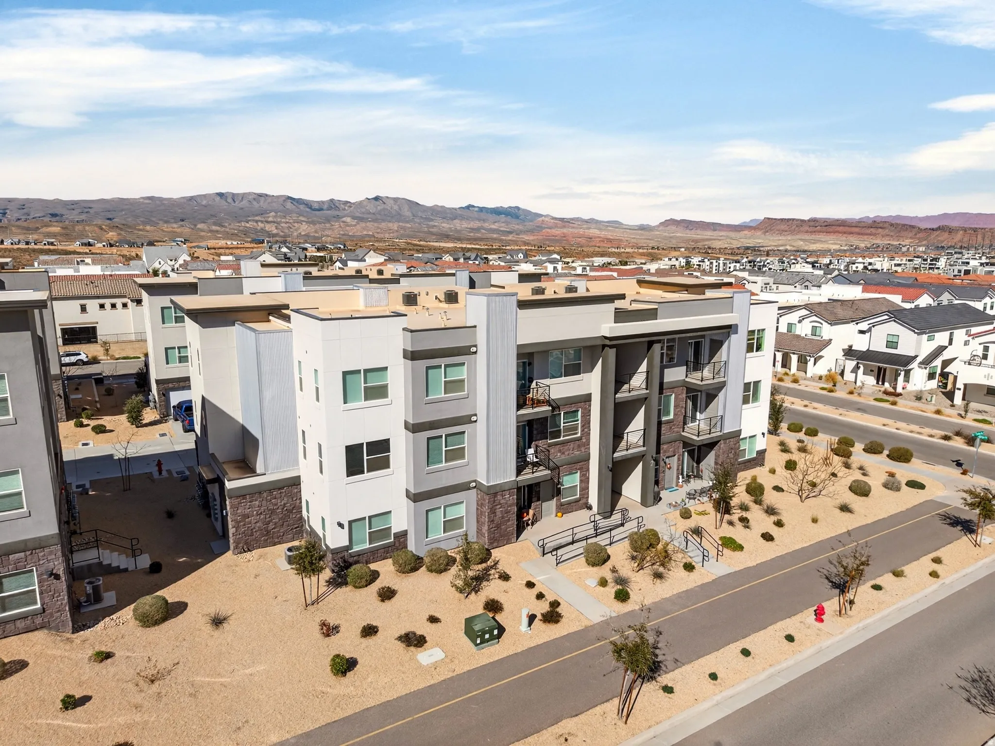 Aerial view of residential area with mountains