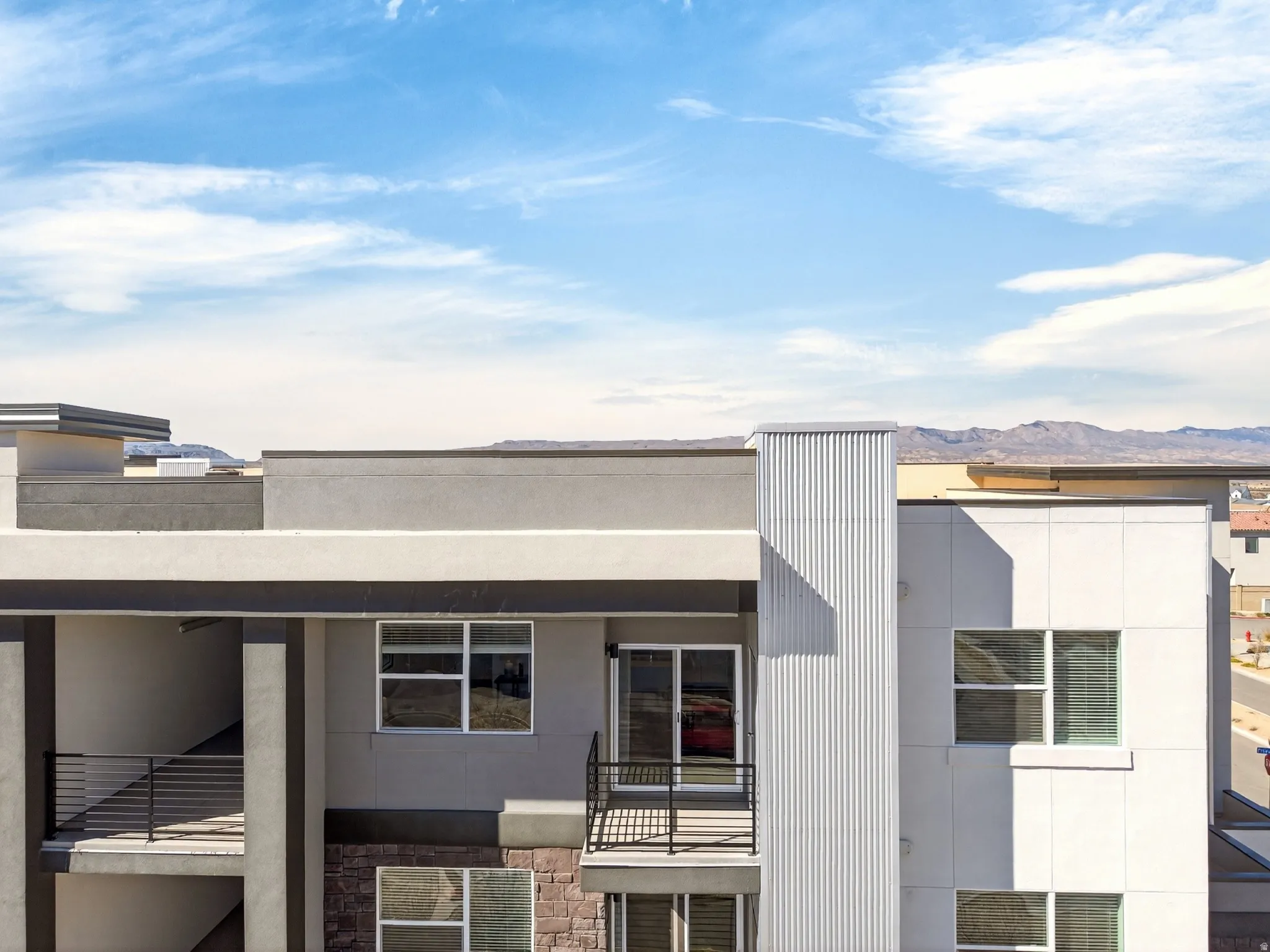 View of property with a mountain view