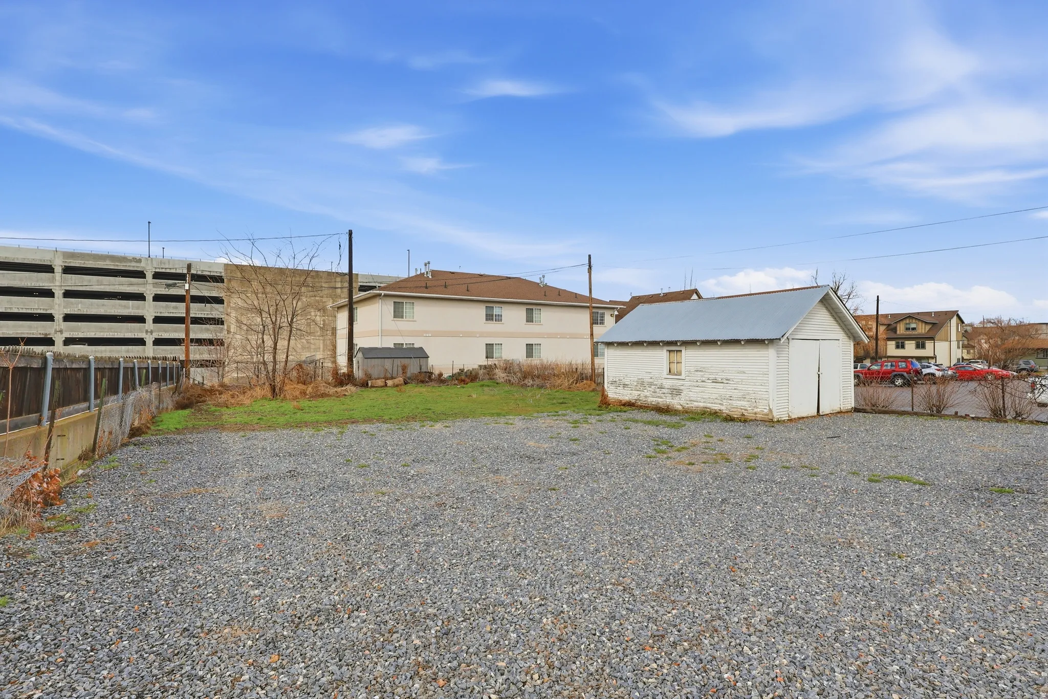 Rear view of property with an outdoor structure