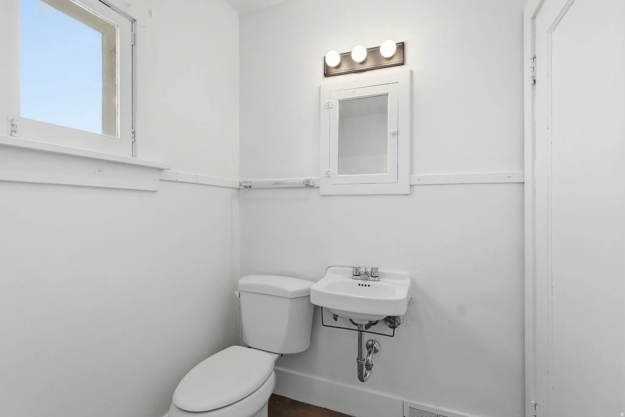 Half bathroom with toilet