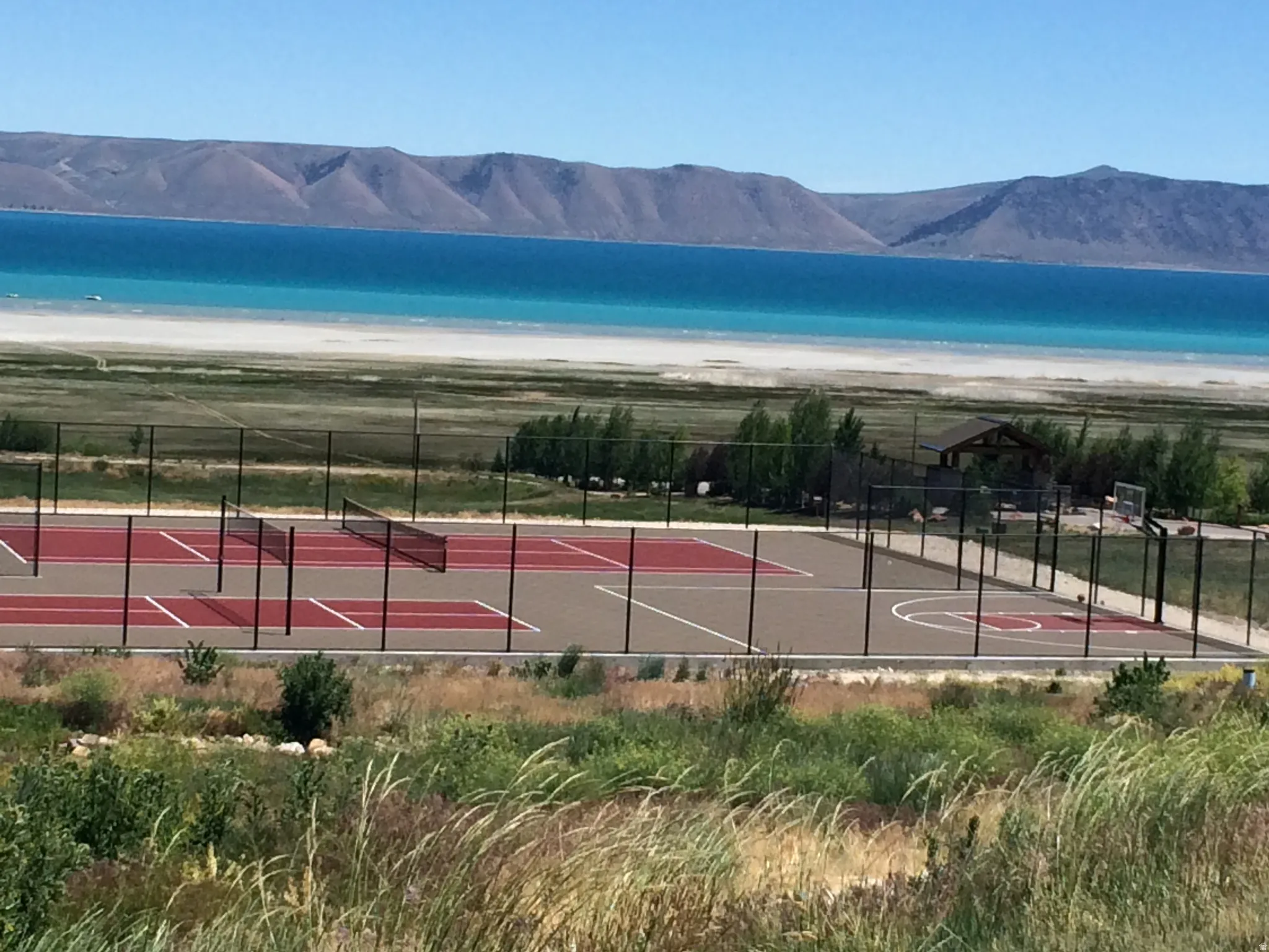 Tennis Court/pickleball CourtsWith full size tennis courts for you and your family, it’s time to get out that dusty racket and get ready to put in the work. Enjoy the mountain scenery and green landscape right from the court.