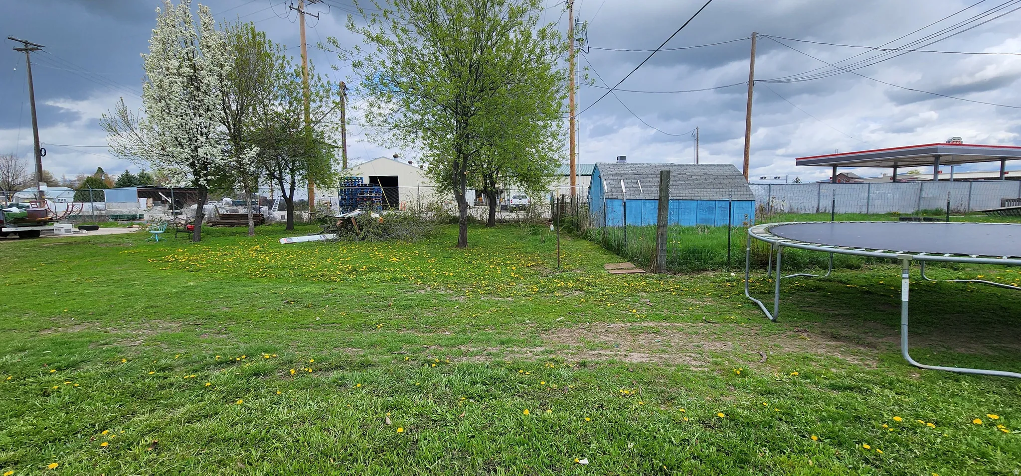 View of yard featuring a trampoline