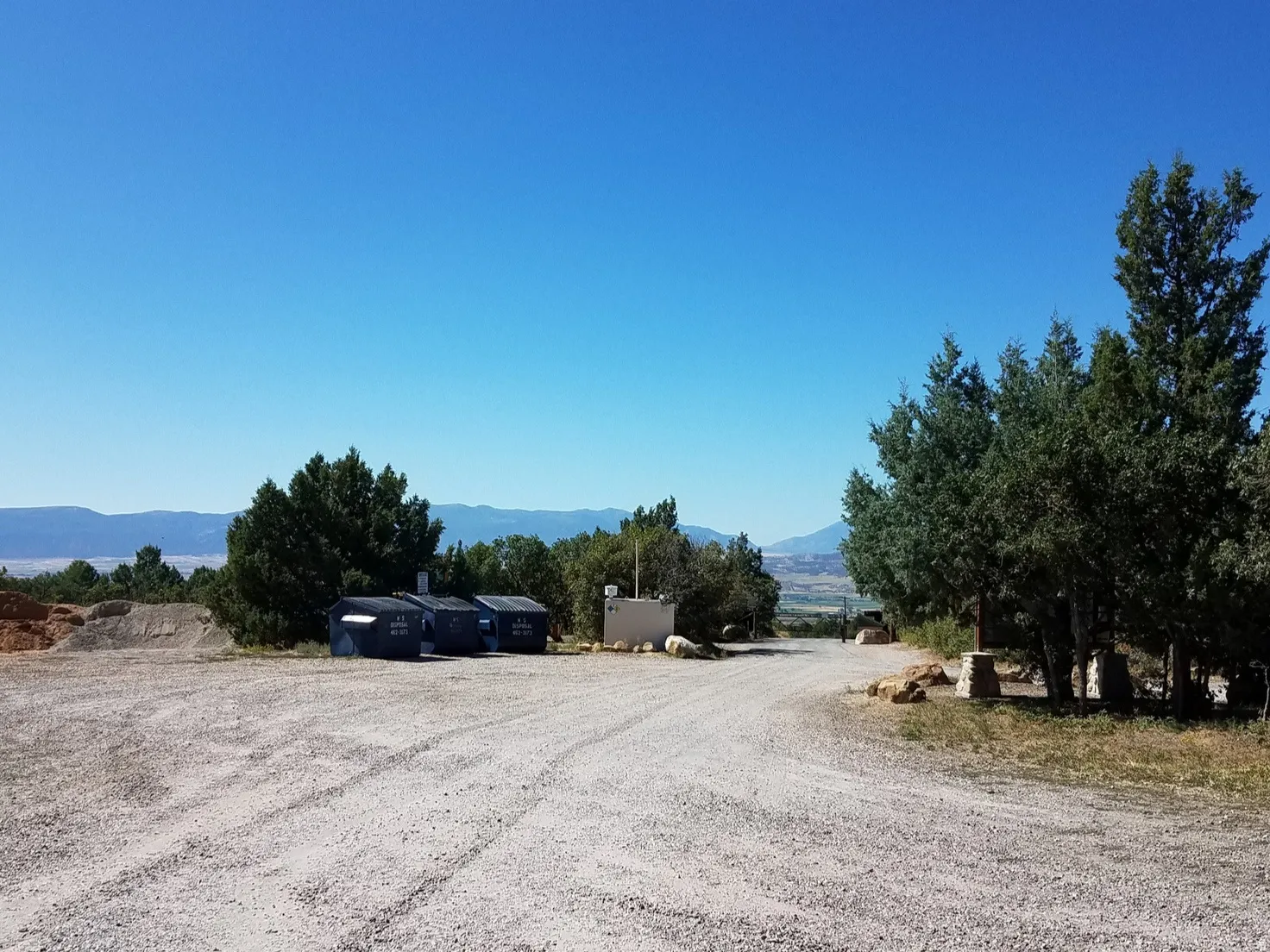 View of dirt / gravel road with a mountain view