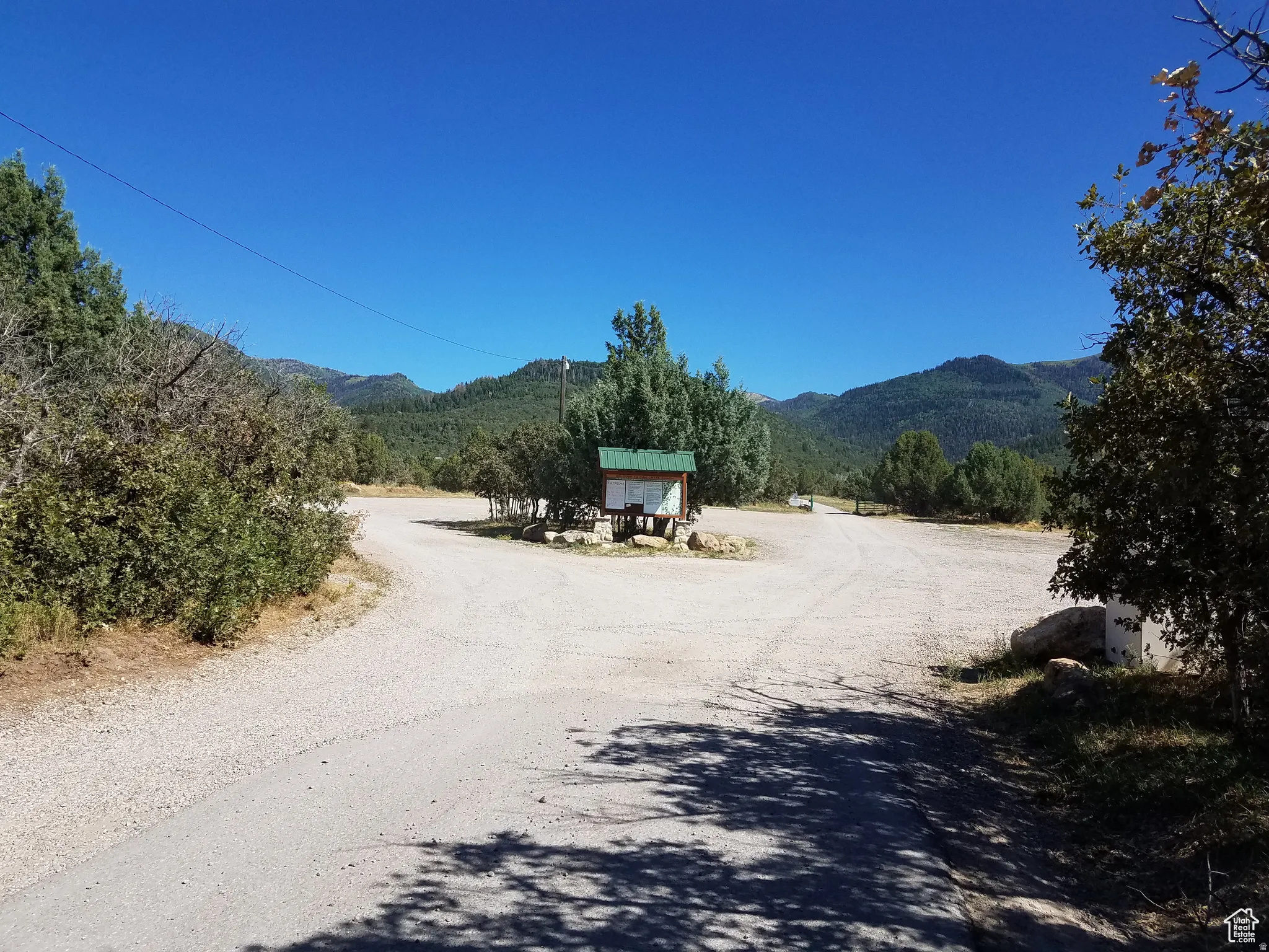 View of asphalt street with a mountain view and a view of countryside