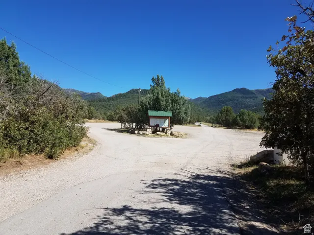 View of asphalt street with a mountain view and a view of countryside