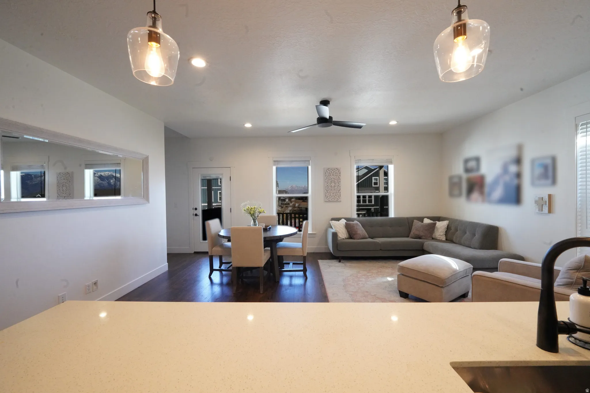 Dining area featuring wood finished floors, recessed lighting, and a ceiling fan