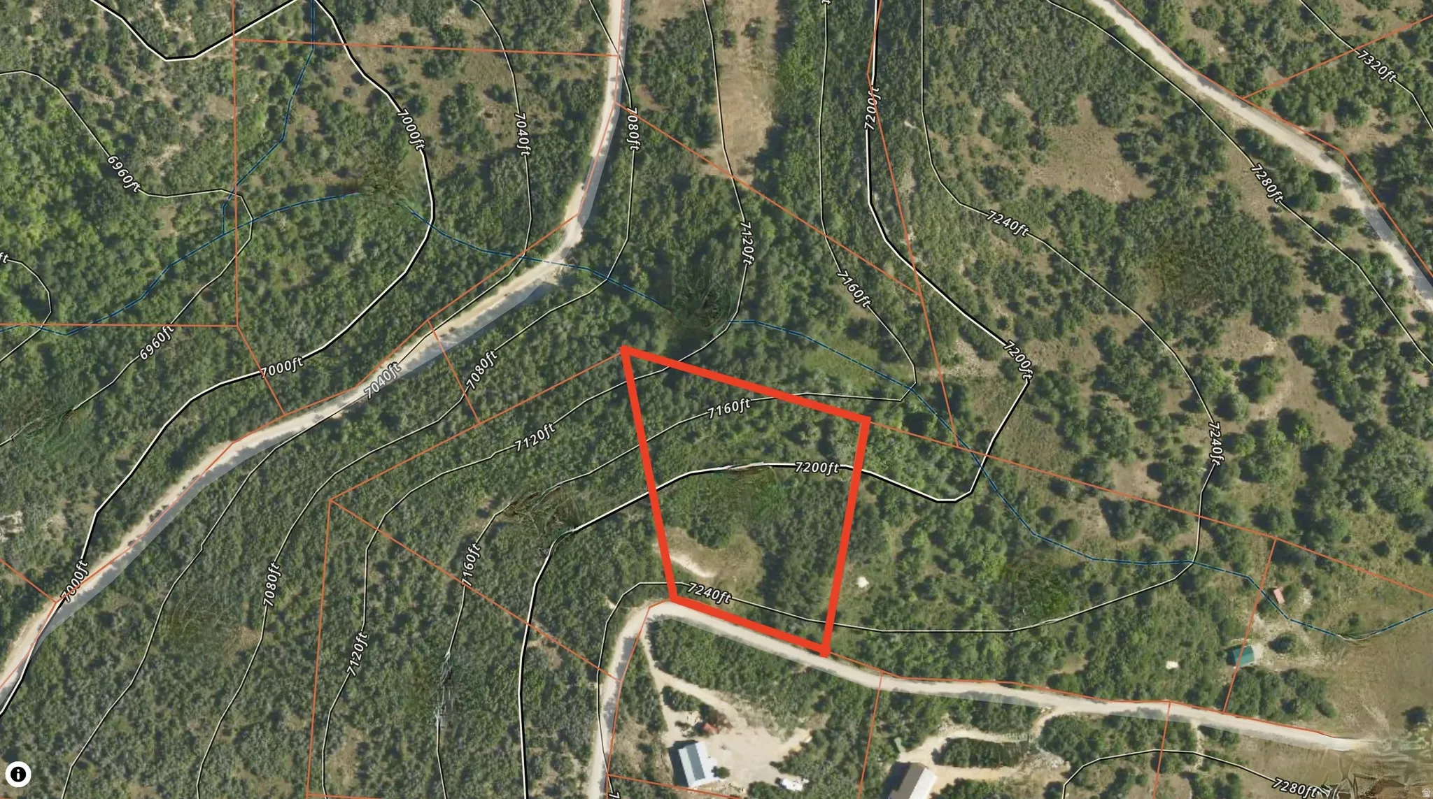 Aerial view of property's location featuring property parcel outlined