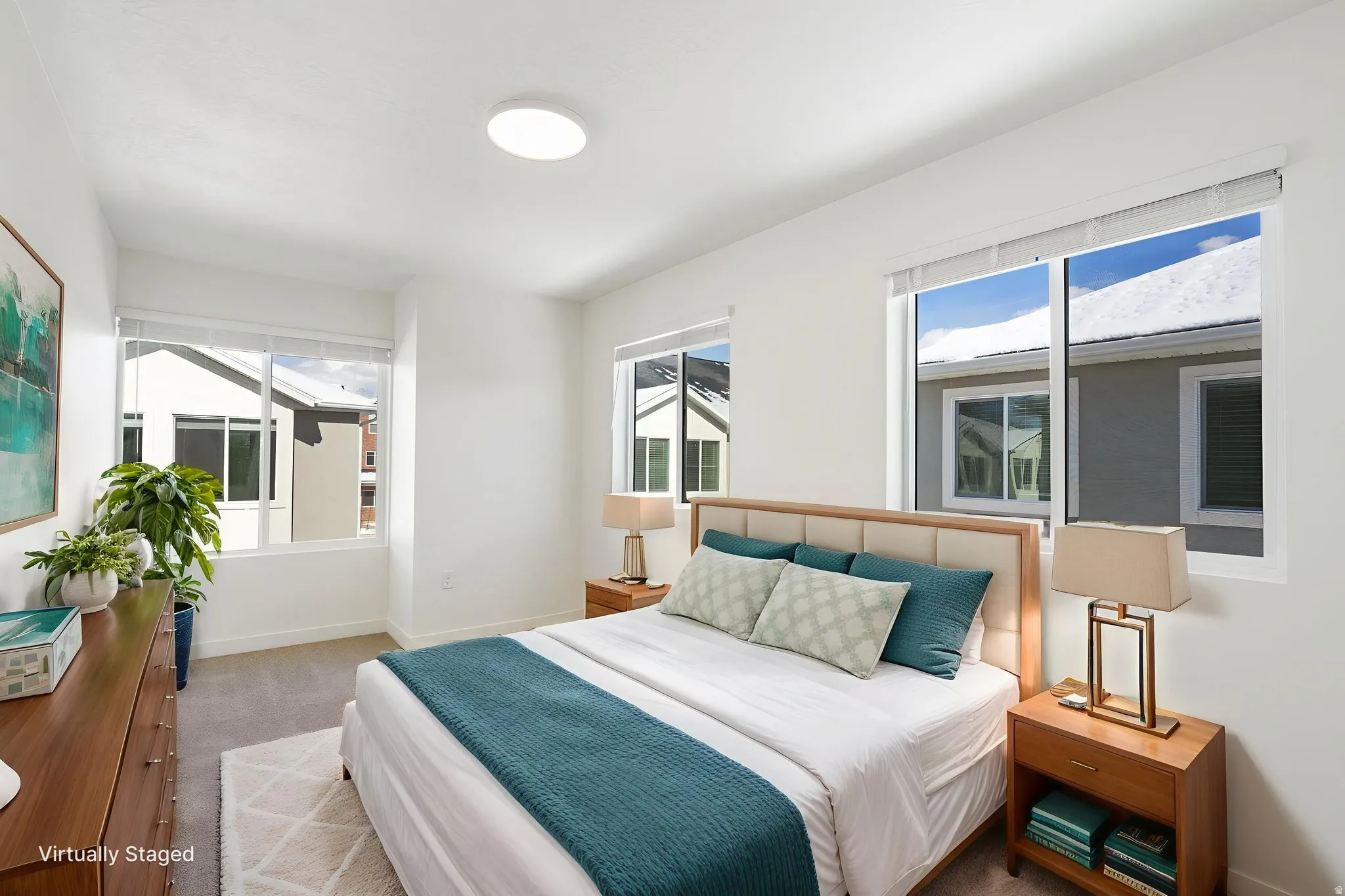 Carpeted bedroom featuring baseboards
