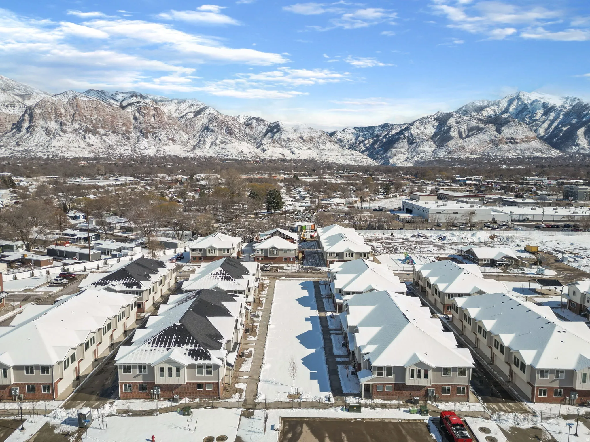 Snowy aerial view with a mountain view