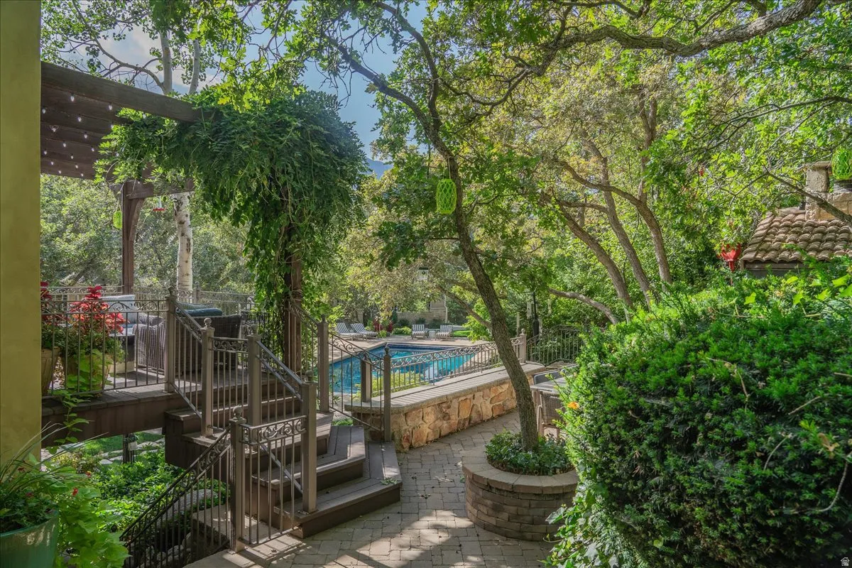 Community pool with a patio area