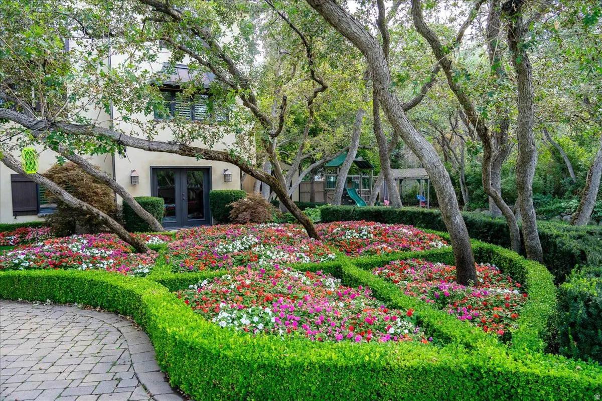 View of home's community featuring a playground