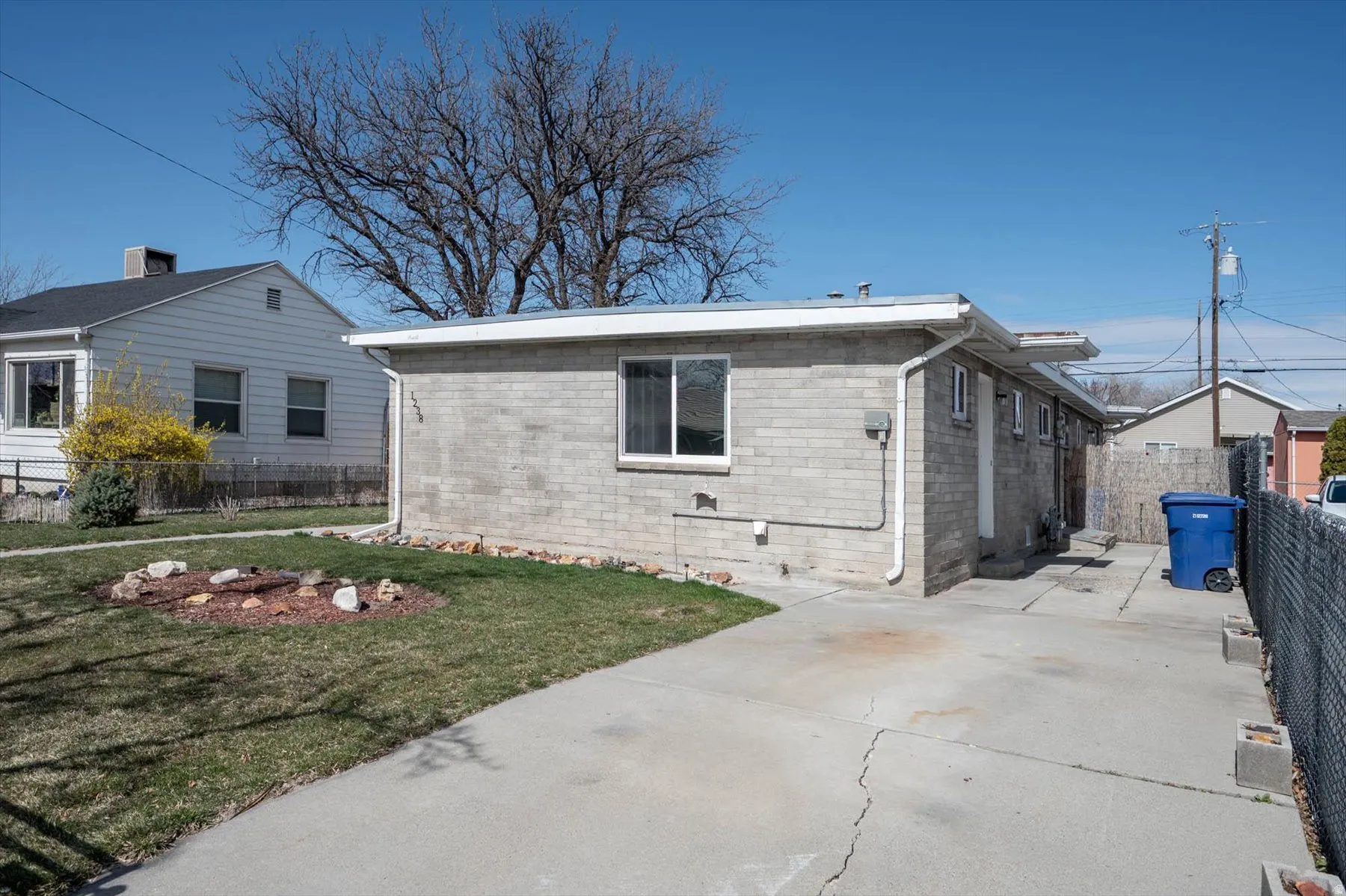 View of side of property with brick siding
