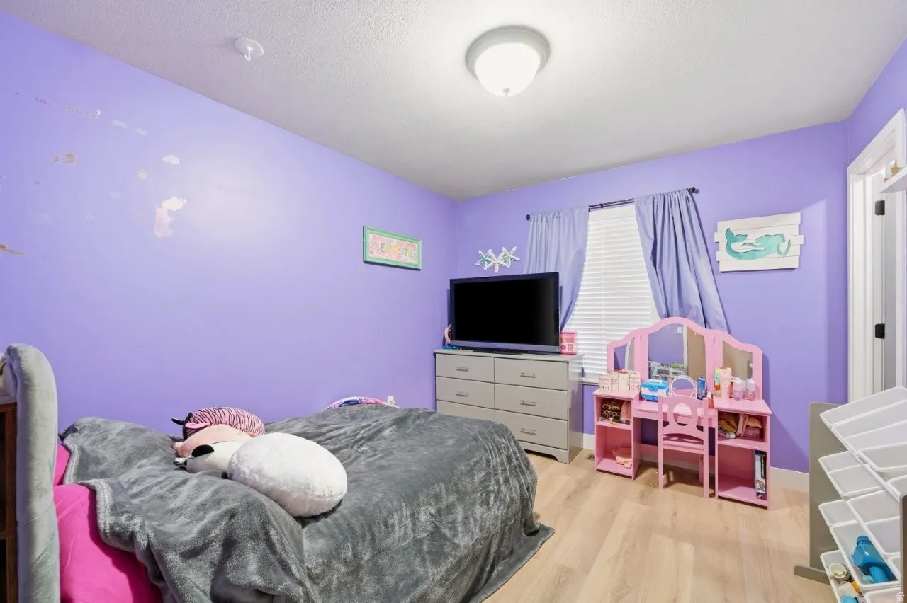 Bedroom featuring light wood finished floors