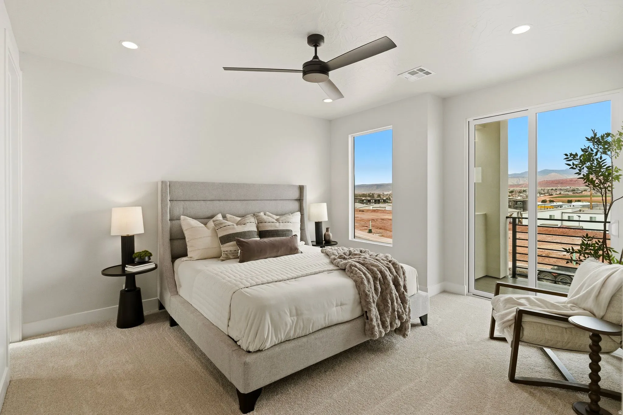 Bedroom with access to outside, light carpet, recessed lighting, and ceiling fan