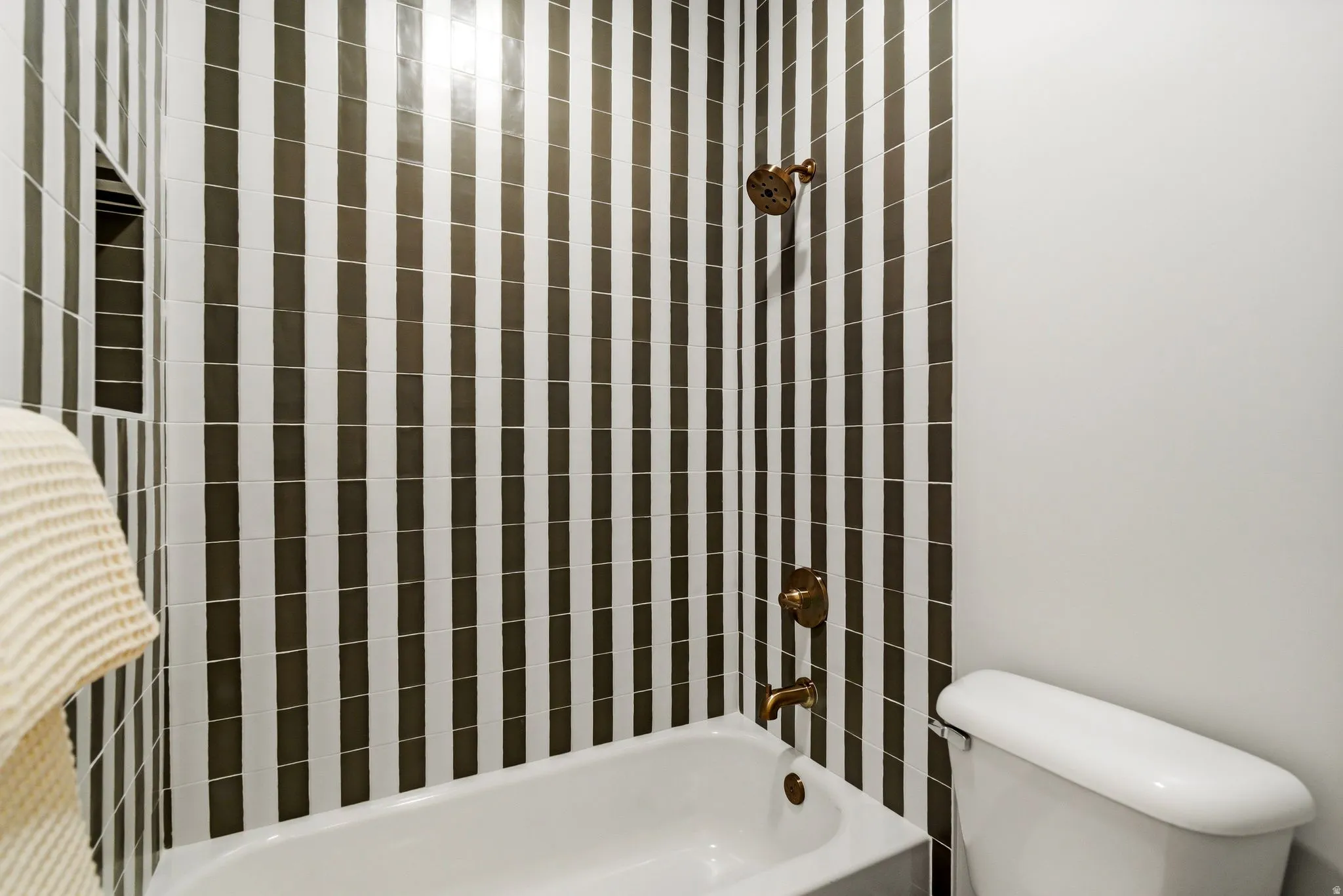 Bathroom with toilet and shower / tub combination