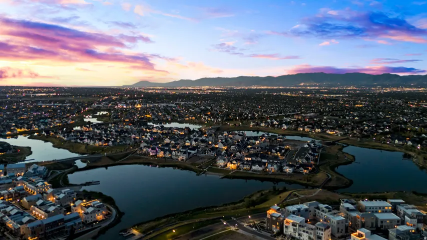 Aerial view at dusk of a water and mountain view