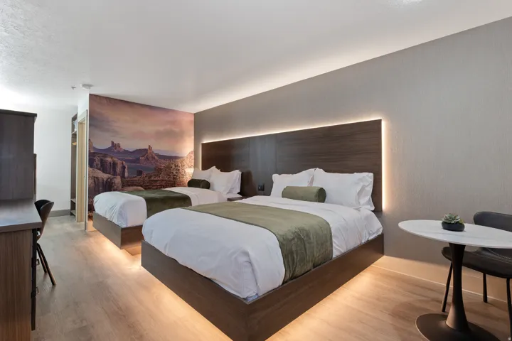 Bedroom featuring light wood-style flooring and baseboards